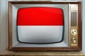 Old tube vintage TV with the national flag of Monaco, Nuremberg, Indonesia on the screen, the concept of eternal values Ã¢â¬â¹Ã¢â¬â¹on